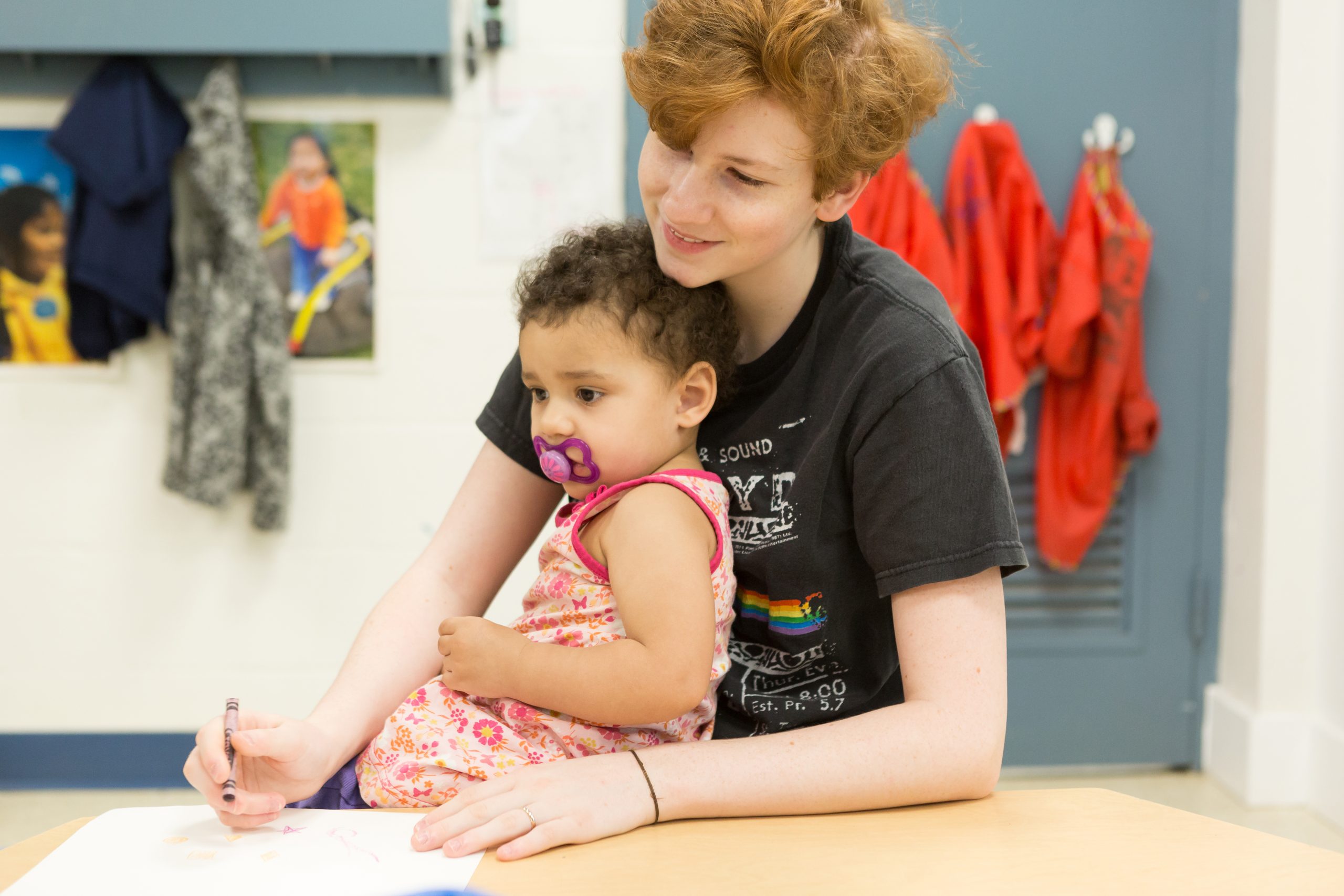 Woman holding toddler